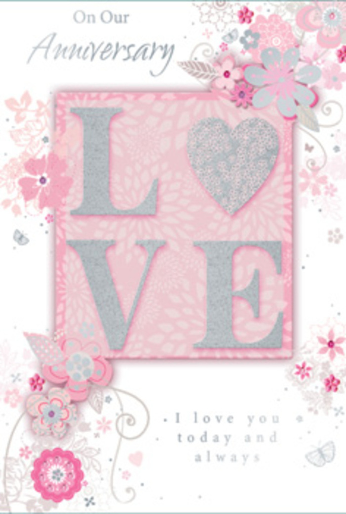 The photograph shows an open anniversary card lying on a smooth surface, its design radiating quiet warmth, like the feeling of stepping into a sun-filled room in Farnborough where love is part of the daily routine. On one side, the main motif-the word LOVE-stands out in an elegant, frosted glitter print. Each letter is raised and delicately dusted, so you can almost sense the tactile delight of tracing the lines, much like following the curves of ribbon tied around a carefully crafted bouquet. The glitter catches the light in playful, understated flashes, reminiscent of sunlight glancing off the ponds and pathways in nearby parks. Around the text, wispy, hand-drawn blooms wander along the borders, their petals tinted in soft shades of pink, lilac, and ivory. Light sprays of foliage and tiny buds interlace between them, the arrangement echoing the way a florist might weave smaller flowers among larger focal blooms when preparing an anniversary delivery to a home near Farnborough's Pinehurst area. Fine flourishes-slender filigree lines, delicate leaves, and almost-hidden butterflies-float through the design, suggesting the gentle flutter of hearts and the joy of shared milestones. On the opposite panel, the heartfelt message I love you today and always, or similarly tender wording, appears in a graceful, understated typeface. The text sits comfortably within the negative space, inviting a pause of gratitude and hope, as though the sender has taken a quiet moment at a table in Farnborough to gather their thoughts. The card feels less like simple stationery and more like a hand-tied bouquet captured in paper form: subtly fragrant in imagination, thoughtfully composed, and ready to accompany a fresh arrangement of roses and seasonal blooms delivered across Farnborough by a caring local florist.